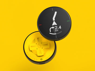 Front and back of the Beeline device