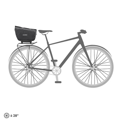 Showing how the Trunk-Bag clips onto a bike rack.
