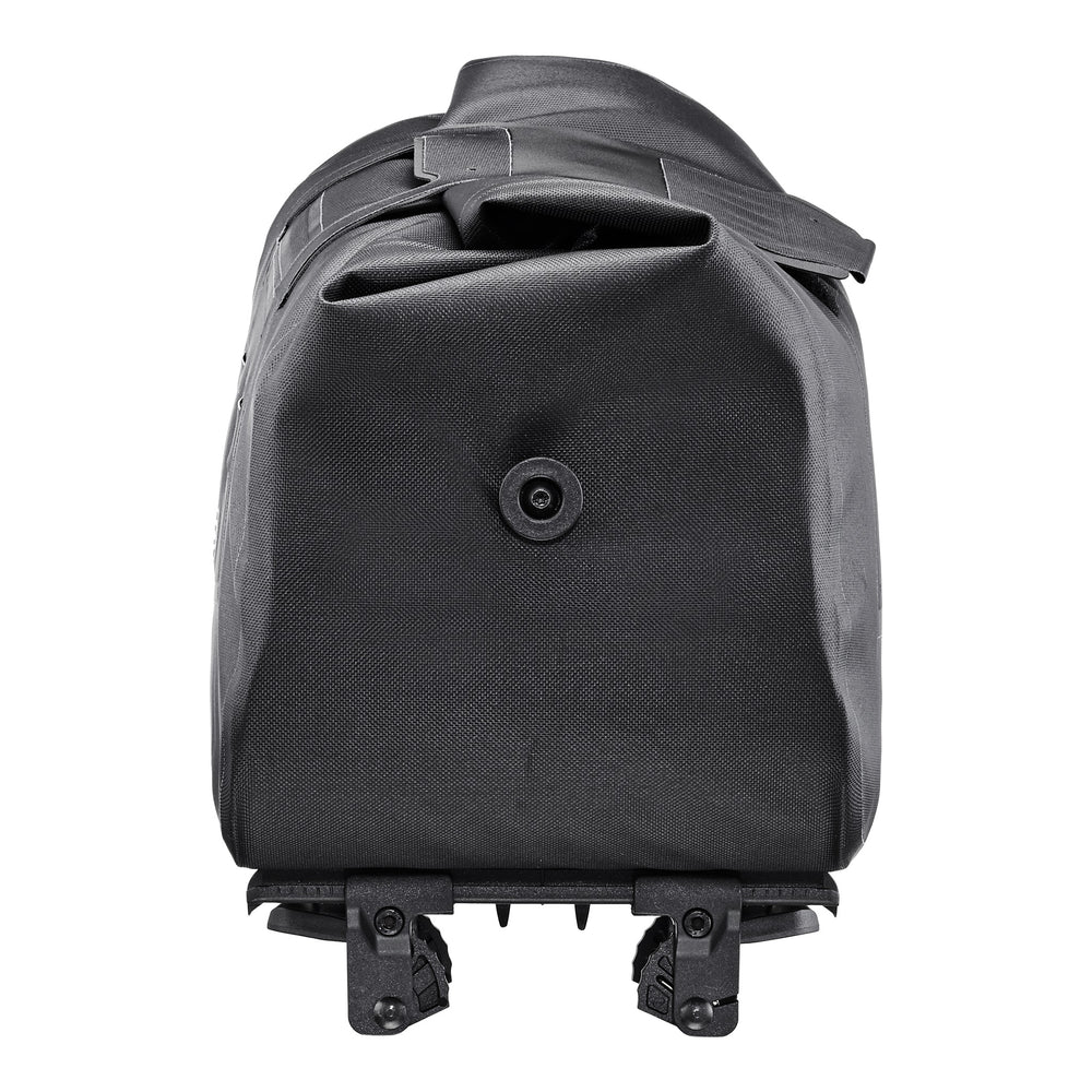 Black trunk-bag with pannier rack attachment clips. 
