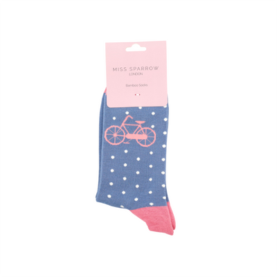 Miss Sparrow Bamboo Socks. Blue sock with a pink bike print and white spots. 