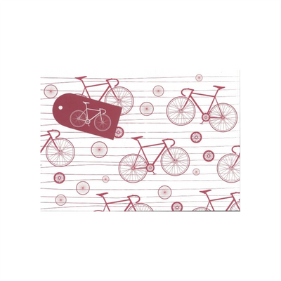 Red bike print wrapping paper with tag